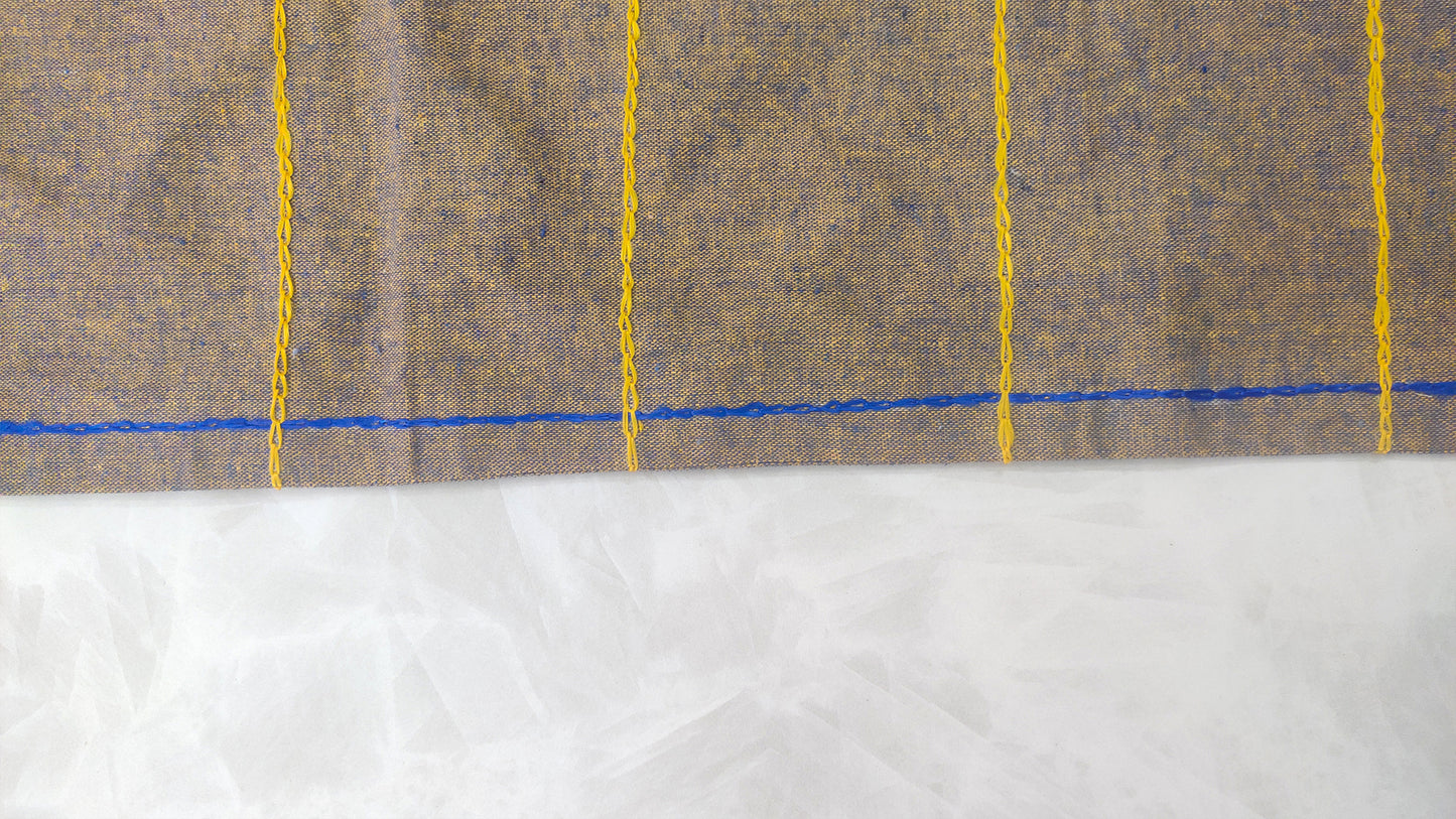 Hand embroidered with purple and yellow golden cotton thread, this handcrafted table runner is paired with set of 6 lap napkins. Designed to be double sided.