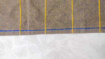 Hand embroidered with purple and yellow golden cotton thread, this handcrafted table runner is paired with set of 6 lap napkins. Designed to be double sided.