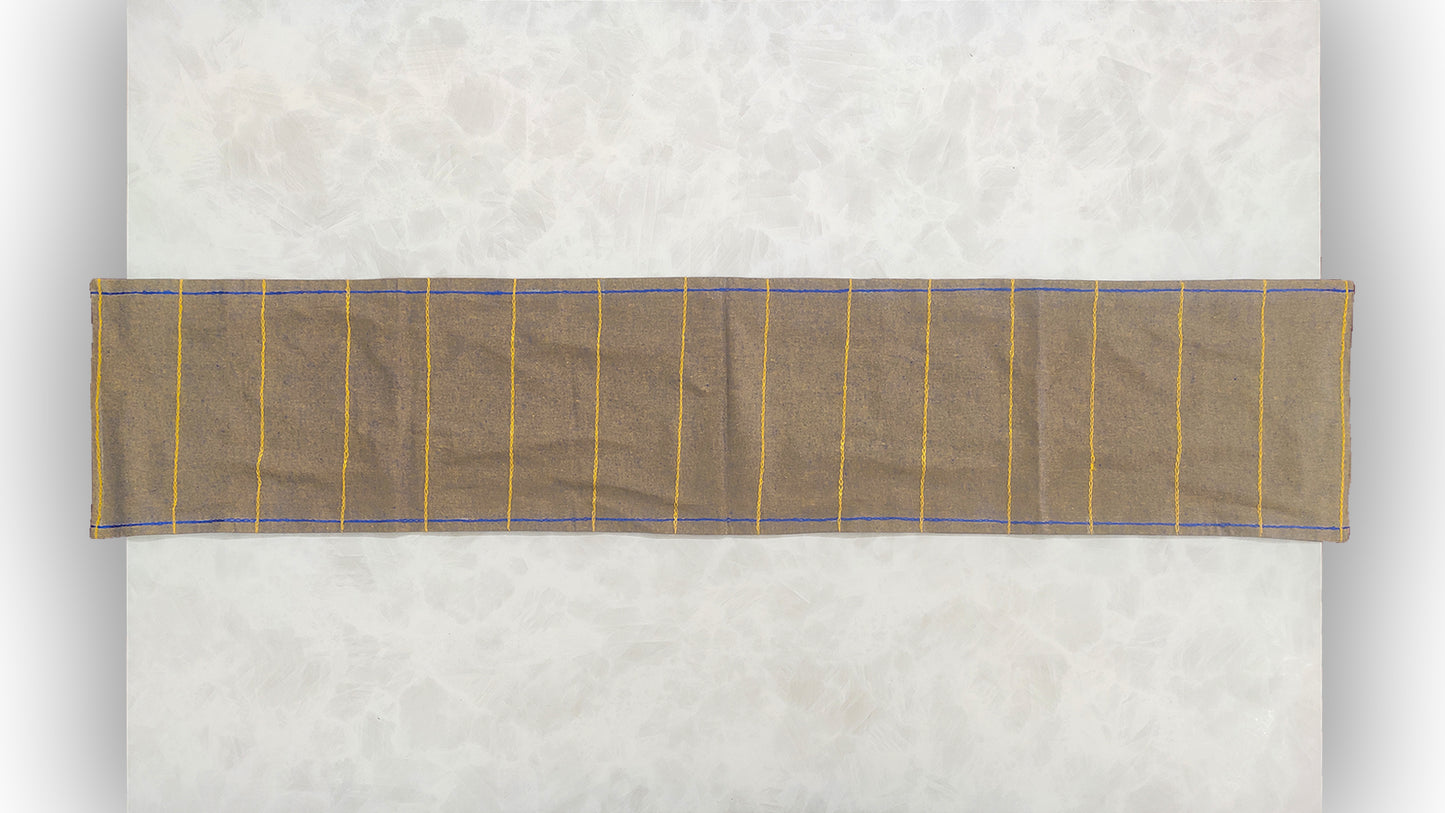 Hand embroidered with purple and yellow golden cotton thread, this handcrafted table runner is paired with set of 6 lap napkins. Designed to be double sided.
